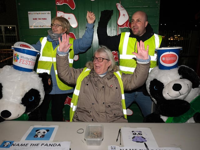 Christmas festival volunteers having fun.