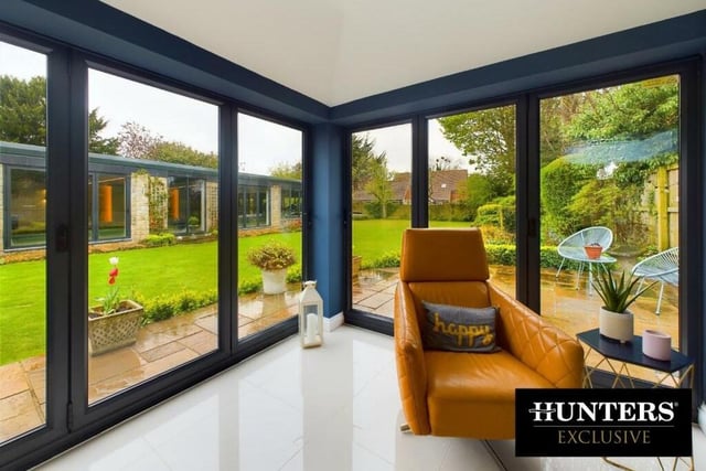 Bright and versatile living space with bi-fold doors to the garden.