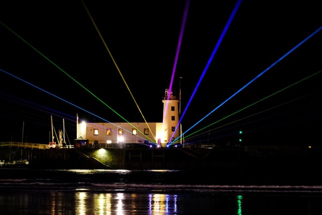 Lasers lighting up Scarborough lighthouse.
picture: Richard Ponter