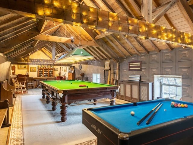 The extensive games room with bar.
