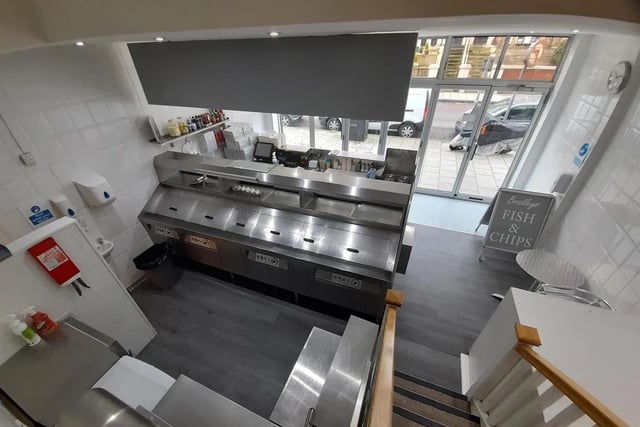 The ground floor takeaway sales area is situated in front of a recently serviced, high-capacity Hopkins four-pan range.