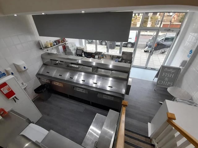 The ground floor takeaway sales area is situated in front of a recently serviced, high-capacity Hopkins four-pan range.