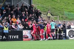 Boro players and fans celebrate the late leveller which looked to have bagged them a play-off spot, but Gloucester City's late winner v Chorley shattered Boro's dreams