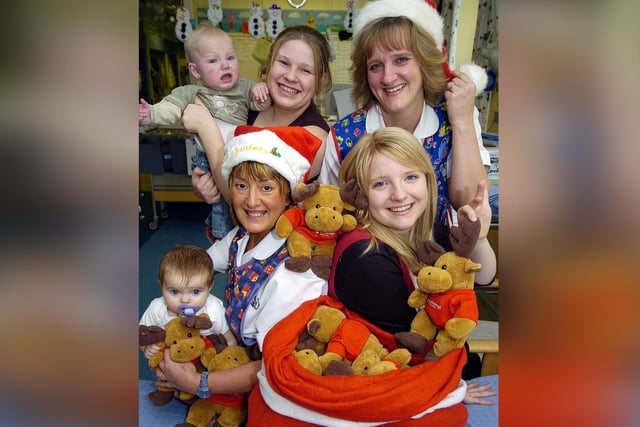 Scarboro Building Society bring toys for Kids at Children Hosp Dept. Back Benjamin Hall and Mum Francis Ramsey, Nurse Tracy Cleminson. Front Ashleigh Spering, Nurse Ann McGregor, Claire Rayne of Scarborough Building Soc.