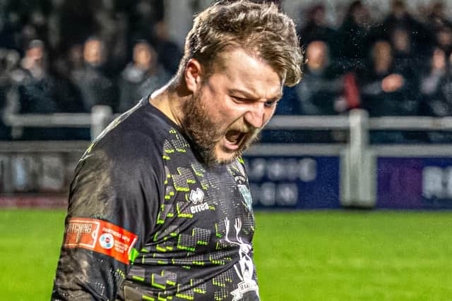 Keeper Shane Bland celebrates saving the first Guisborough penalty.