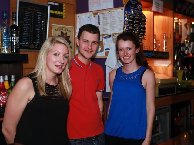 Kat, Connor and Sophia serving the customer's at The George.