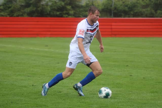 Connor Smith on the ball for the Blues at Redcar Athletic. PHOTOS BY OWEN COX