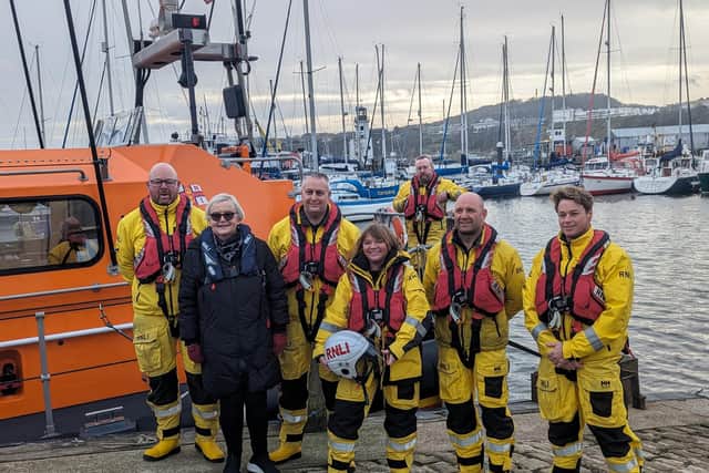 Filming with Songs of Praise with Rev Kate Bottley in full RNLI Kit. Image: RNLI/ DLPO Nick Gough