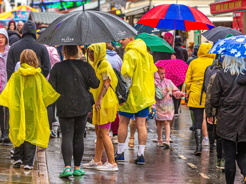 Braving the showers on Monday at the regatta.
picture: Brian Murfield.