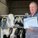 Martin Stephenson shows off his award