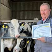 Martin Stephenson shows off his award