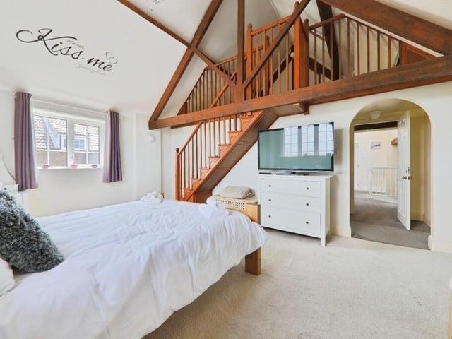 Another of the stunning bedrooms within the property.