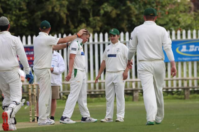 Thomas Shephard is congratulated on one of his six wickets for Brid 2nds