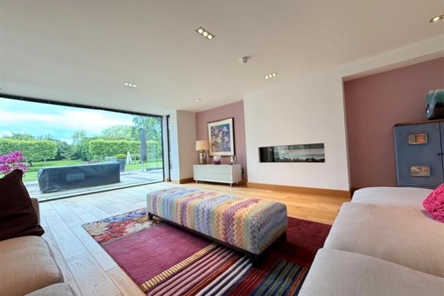 The lounge has large sliding doors to the rear garden.