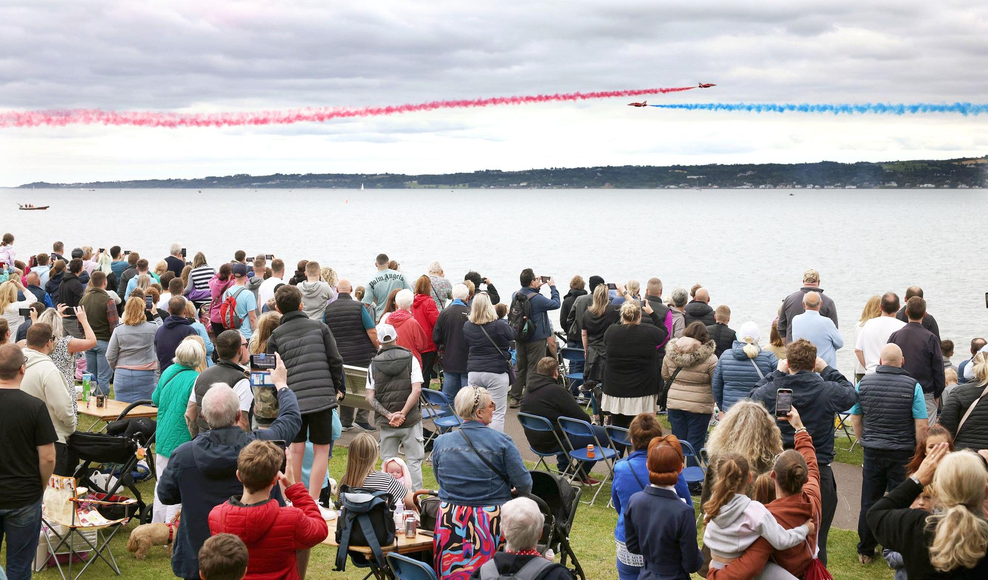 Armed Forces Day: RAF Red Arrows delight crowds with dramatic aerobatic display