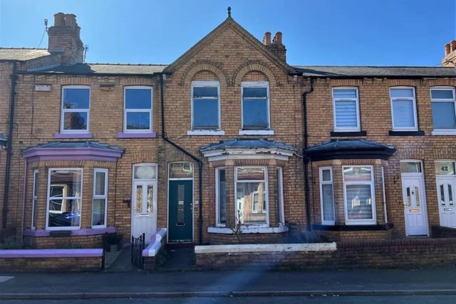 This two bedroom, one bathroom mid terrace home is for sale with Ellis Hay for £120,000.