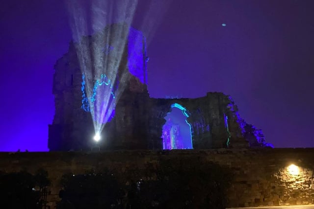 English Heritage lights up the ruins of iconic site Whitby Abbey in North Yorkshire.