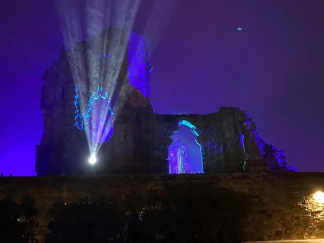 English Heritage lights up the ruins of iconic site Whitby Abbey in North Yorkshire.