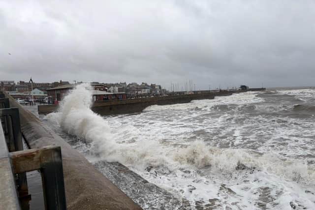Ian Sandy captures waves crashing against the sea wall.