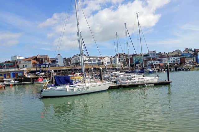 Shelagh E Wallace focuses on some harbour yachts.