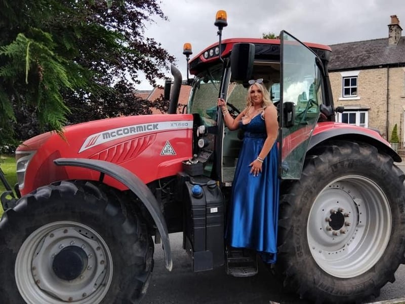 This beautiful girl has got a fantastic ride to prom!