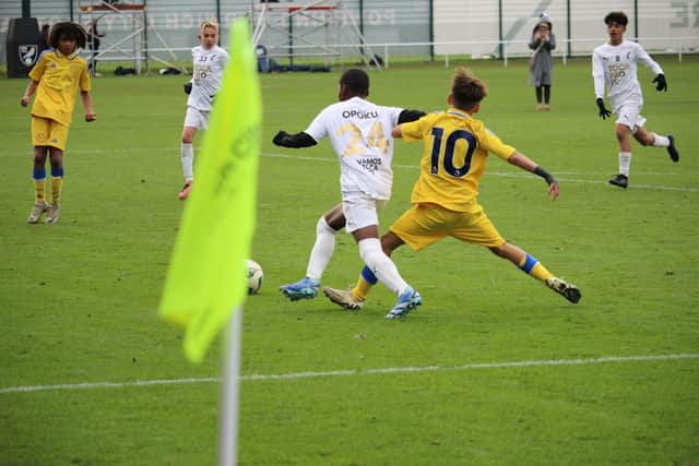 MJ Opoku running past Leeds United defender