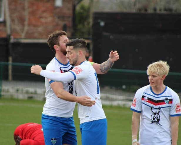 Stephen Walker celebrates putting Whitby 1-0 up at Ashton United. PHOTOS BY OWEN COX