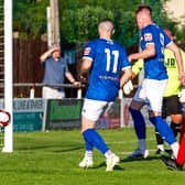 Jerome Greaves scores the opening goal for Whitby Town. PHOTOS BY BRIAN MURFIELD