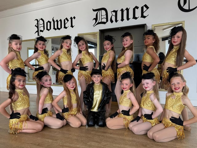Fierce strike a pose prior to performing jazz piece Vogue