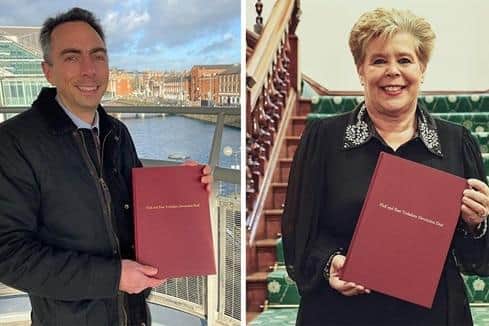 Cllrs Mike Ross and Anne Handley with a copy of the proposed devolution deal.