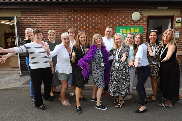 Staff celebrate the opening