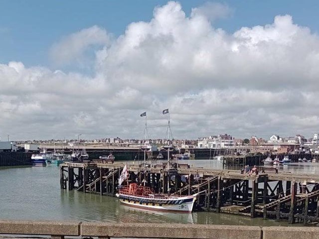 Bridlington harbour glinting in the sunshine.