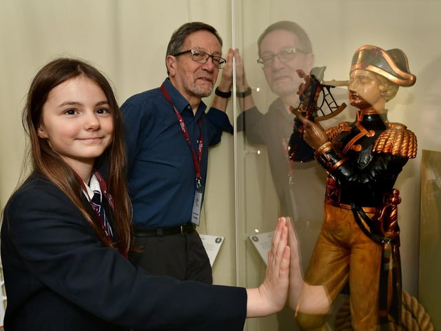 An Eskdale School student with Cook Museum staff member Steve Barnard looking at one of the exhibits.
picture: Richard Ponter