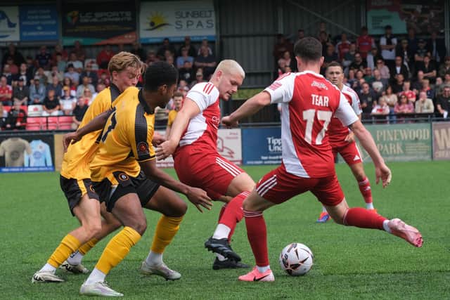 Boro's Dom Tear, right, and Bailey Gooda in action against Rushall.
