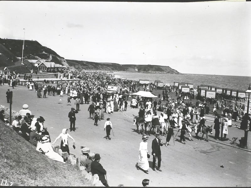 Circa 1913; Crowds and donkey rides on the North Side of the beach at Scarborough. (Photo by Hulton Archive/Getty Images)