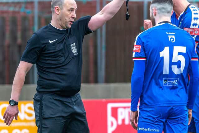 Referee Chris Ellis sends Bradley Fewster off.