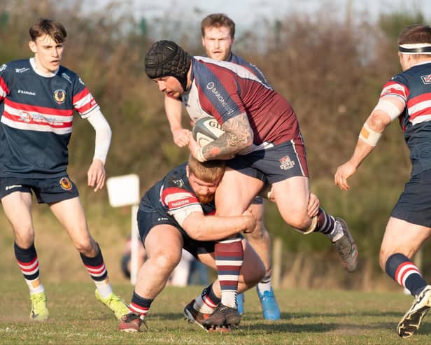 Sam Dawson carries the ball forward for Scarborough in their win at Doncaster. Photo by Andy Standing