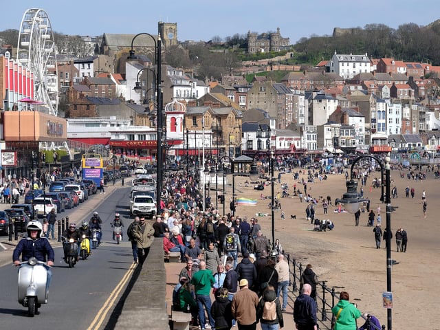 Enjoying the sunshine on the seafront.