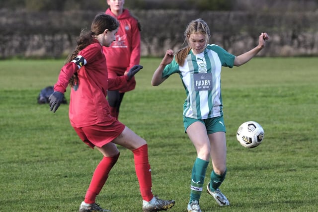 Hosts Scarborough Ladies Under-14s, red, challenge rivals Wigginton at Sherburn