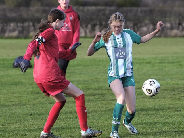 Hosts Scarborough Ladies Under-14s, red, challenge rivals Wigginton at Sherburn