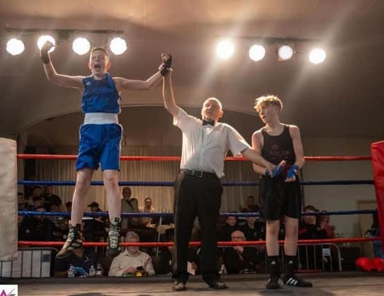 Nico Dale is declared the winner in the fight at Guisborough TA Club.