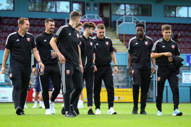 The Boro players have a walk on the Shields pitch before the match.