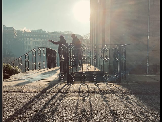 Lovely sunlight shines down on these two people.