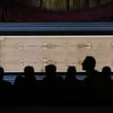 The actual Turin Shroud on display in Italy in 2015 - Photo: MARCO BERTORELLO/AFP via Getty Images