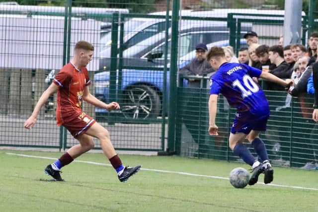 A Pandas forward works his way down the right wing in the cup clash.