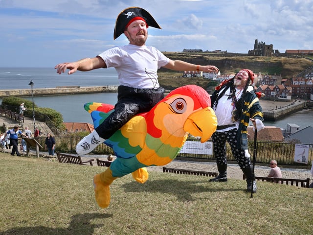 Whitby Pirate Festival on West Cliff, is it a bird?...No a flying Pirate Jack Stansfield with Dad Gary!