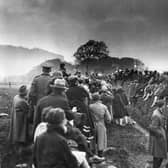 Crowds gathered on a hill near Giggleswick, north Yorkshire, to view a total eclipse of the sun in June 1927. The previous such eclipse had been in 1724, and the next would occur in 1999.