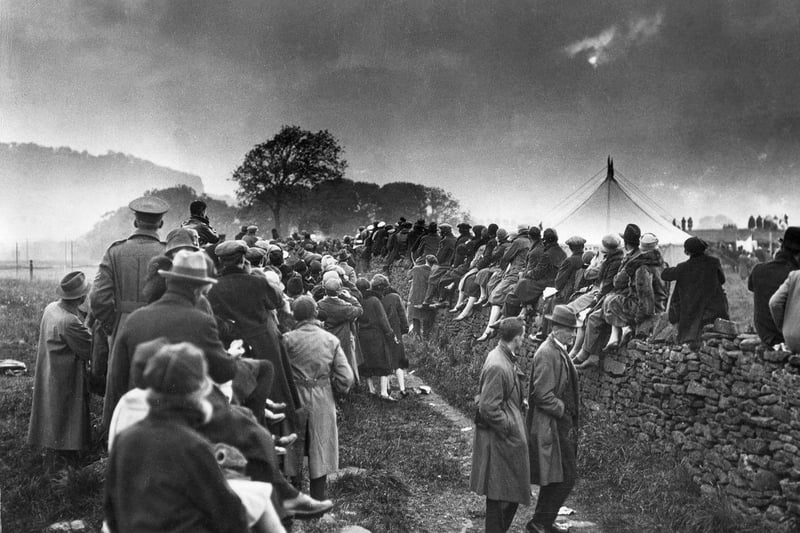 Crowds gathered on a hill near Giggleswick, north Yorkshire, to view a total eclipse of the sun in June 1927. The previous such eclipse had been in 1724, and the next would occur in 1999.