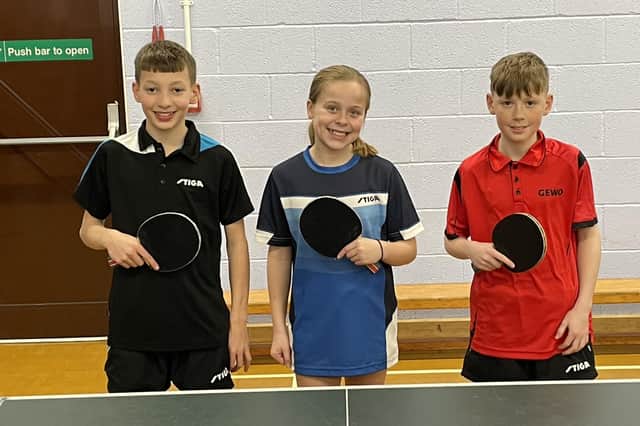 Premier Wolves, from left, Seb Richards, Phoebe O'Brien, Jack Evans.