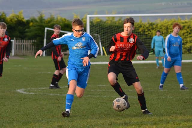 Heslerton Pirates U16s, blue kit, take on Easingwold. PHOTO BY CHERIE ALLARDICE